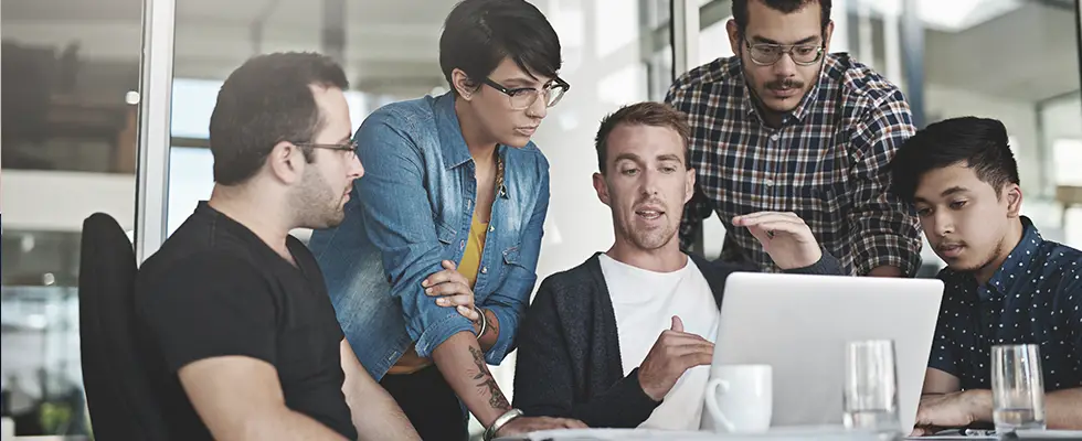 Software champions from different departments discussing future optimizations to their shared interfaces