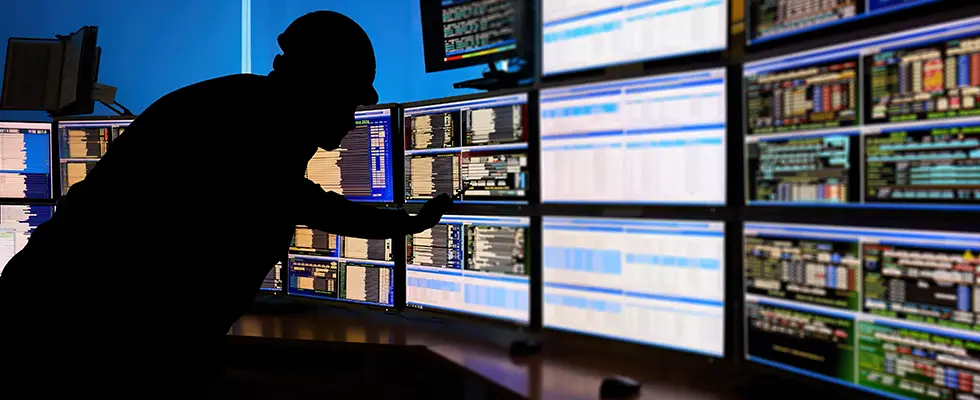A worker interfacing with an Industrial SCADA interface